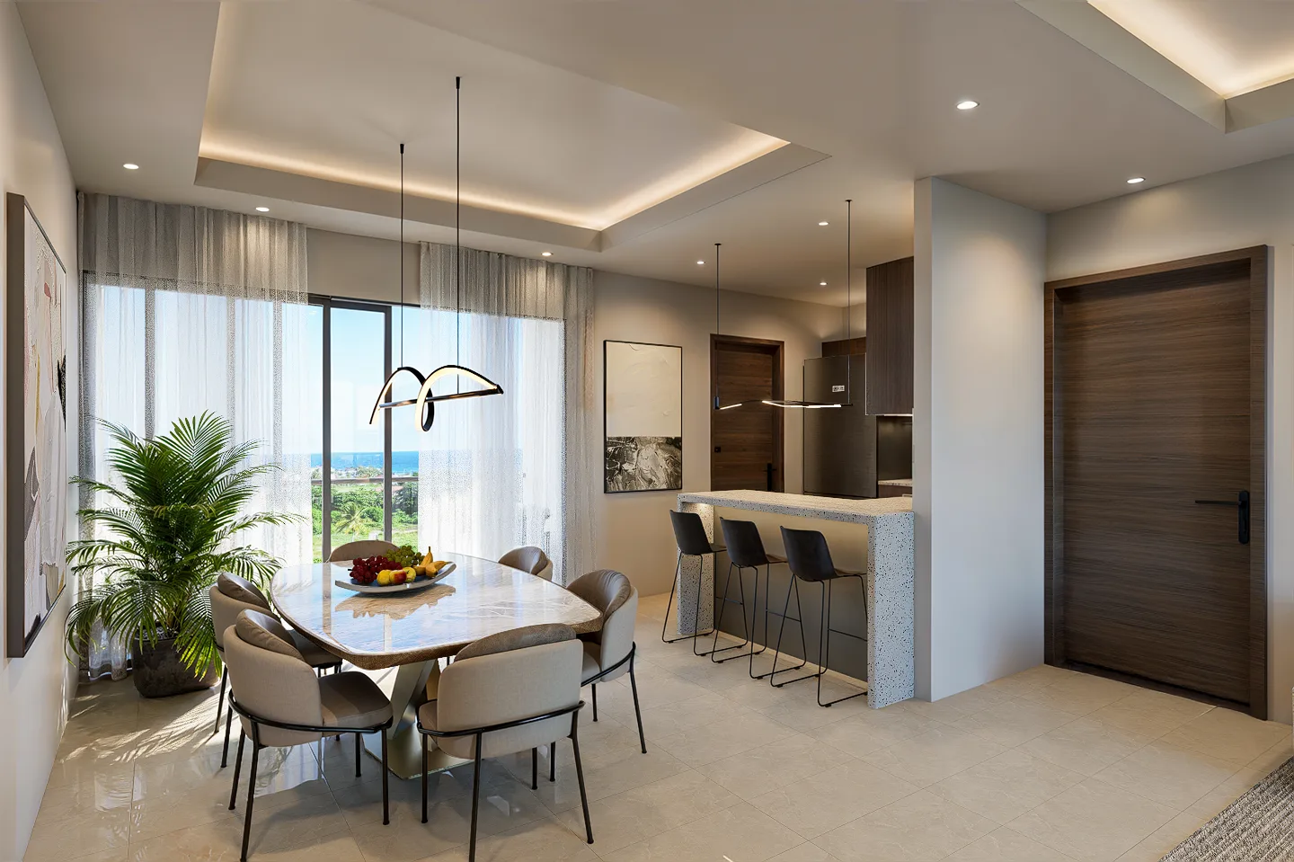 Dining area and open kitchen at Brisas Residences