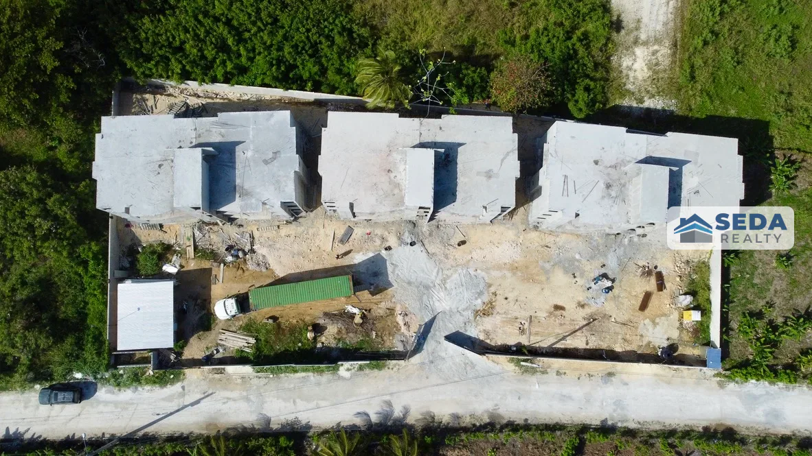 Overhead view of the site and roofs of all three Brisas Residences buildings